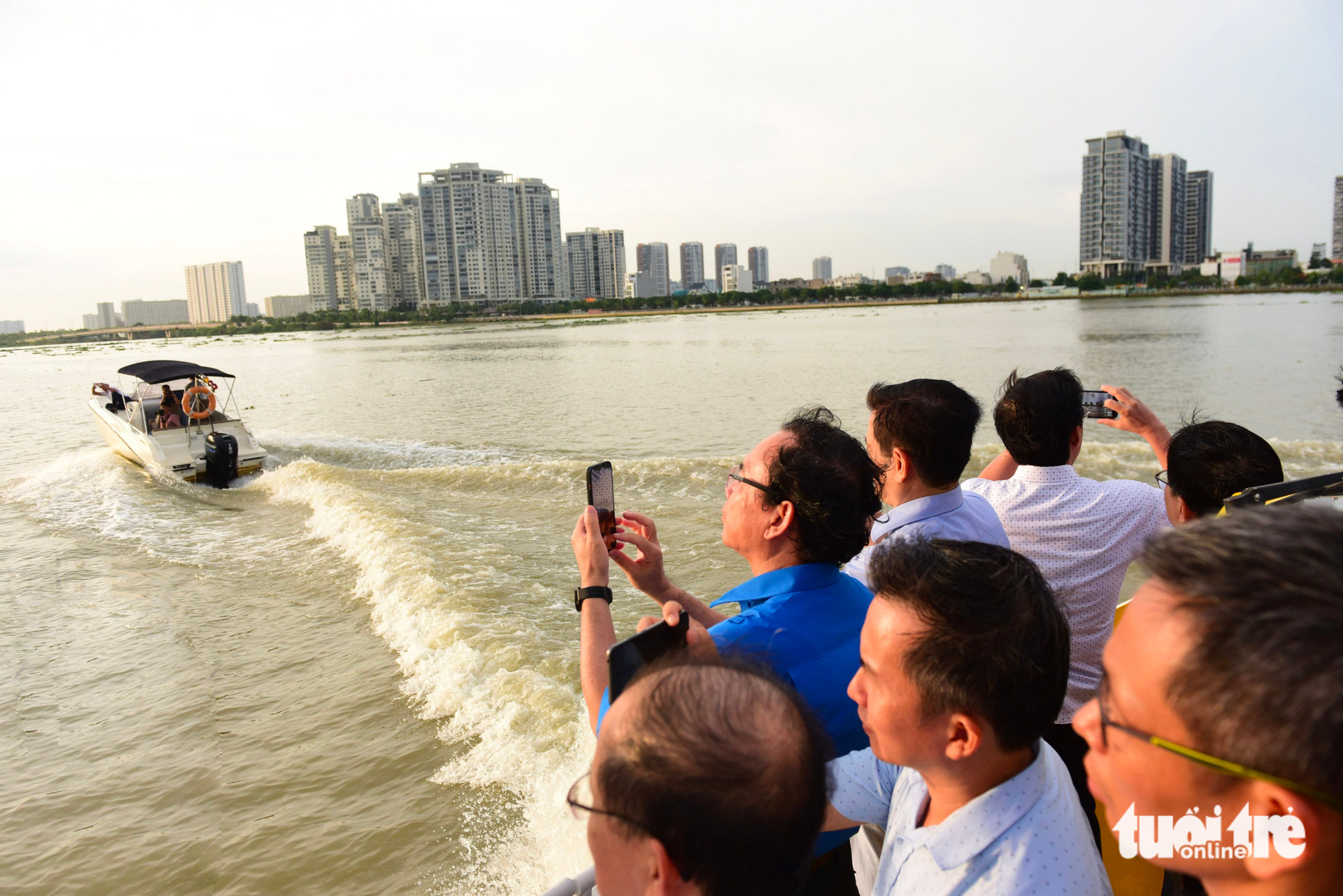 A file photo shows a delegation of experts and representatives of Ho Chi Minh City authorities taking a water bus tour to survey the Saigon River. Photo: Duyen Phan/ Tuoi Tre