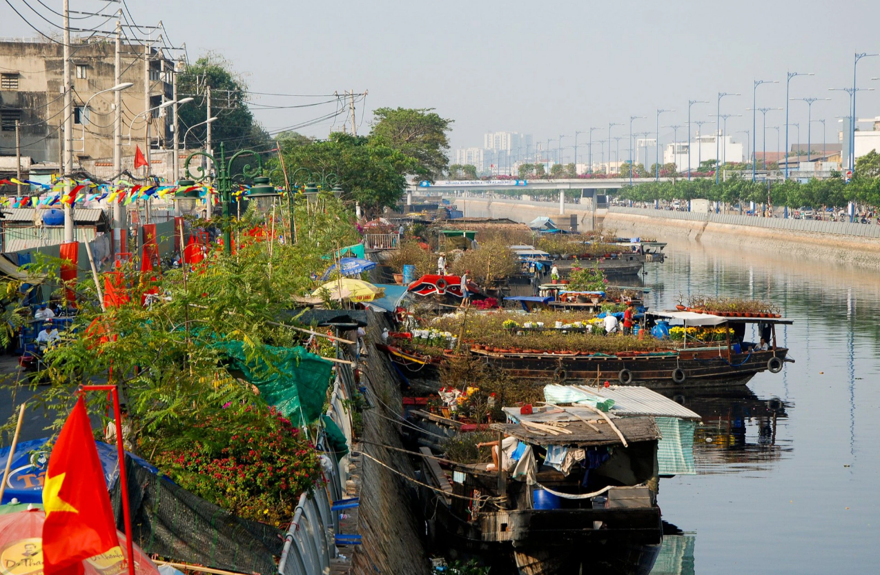 Binh Dong Wharf  is packed with flower-laden boats on Tet, or Lunar New Year holidays. Photo: Vo Linh / Tuoi Tre