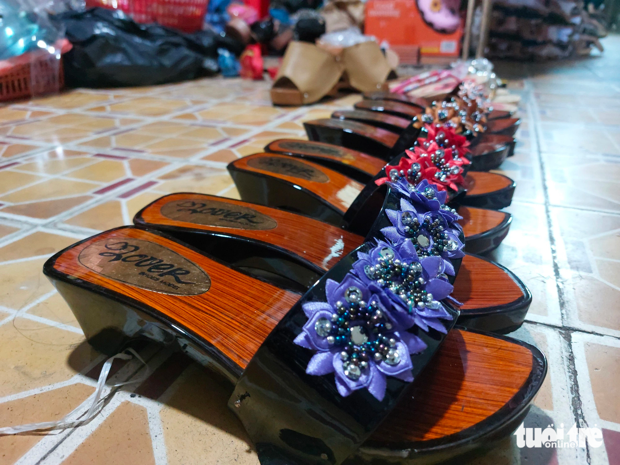 Pairs of guốc mộc made by hand at Yen's shop. Photo: Tong Khoa / Tuoi Tre