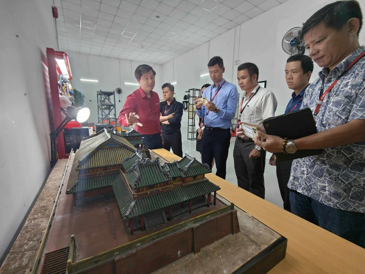 A complex house model is crafted using a 3D printer at the 3DS 3D printing workshop in Thu Duc City, Ho Chi Minh City. Photo: Duc Thien / Tuoi Tre