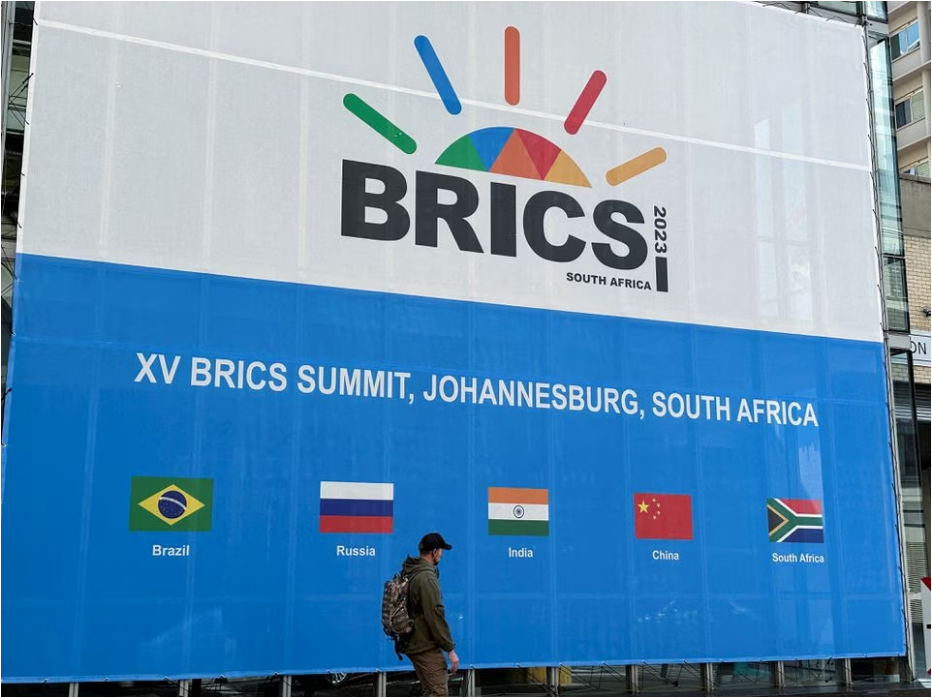 A person walks past the Sandton Convention Centre, which will host the upcoming BRICS Summit, in Johannesburg, South Africa August 19, 2023. Photo: Reuters