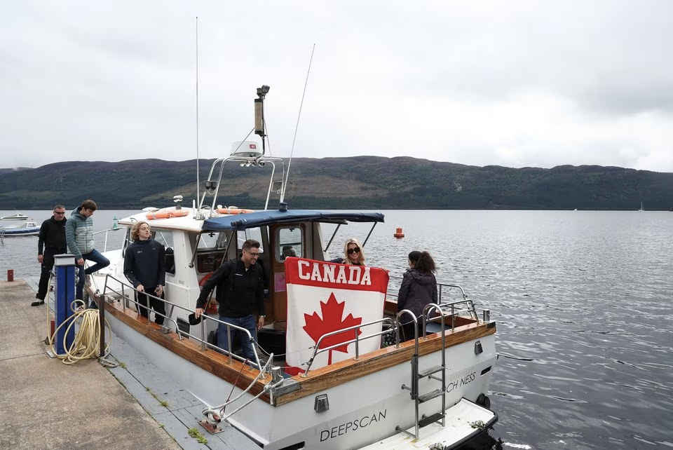 Volunteers get ready to take off in the Loch Ness Project Research Vessel, Deep Scan, as they take part in the largest Loch Ness Monster hunt for 50 years in Scotland, Britain, August 27, 2023. Photo: Reuters