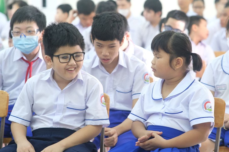 Students at Nguyen Dinh Chieu School for the Blind in Ho Chi Minh City are happy to meet their friends again after a summer holiday. Photo: Ngoc Phuong / Tuoi Tre
