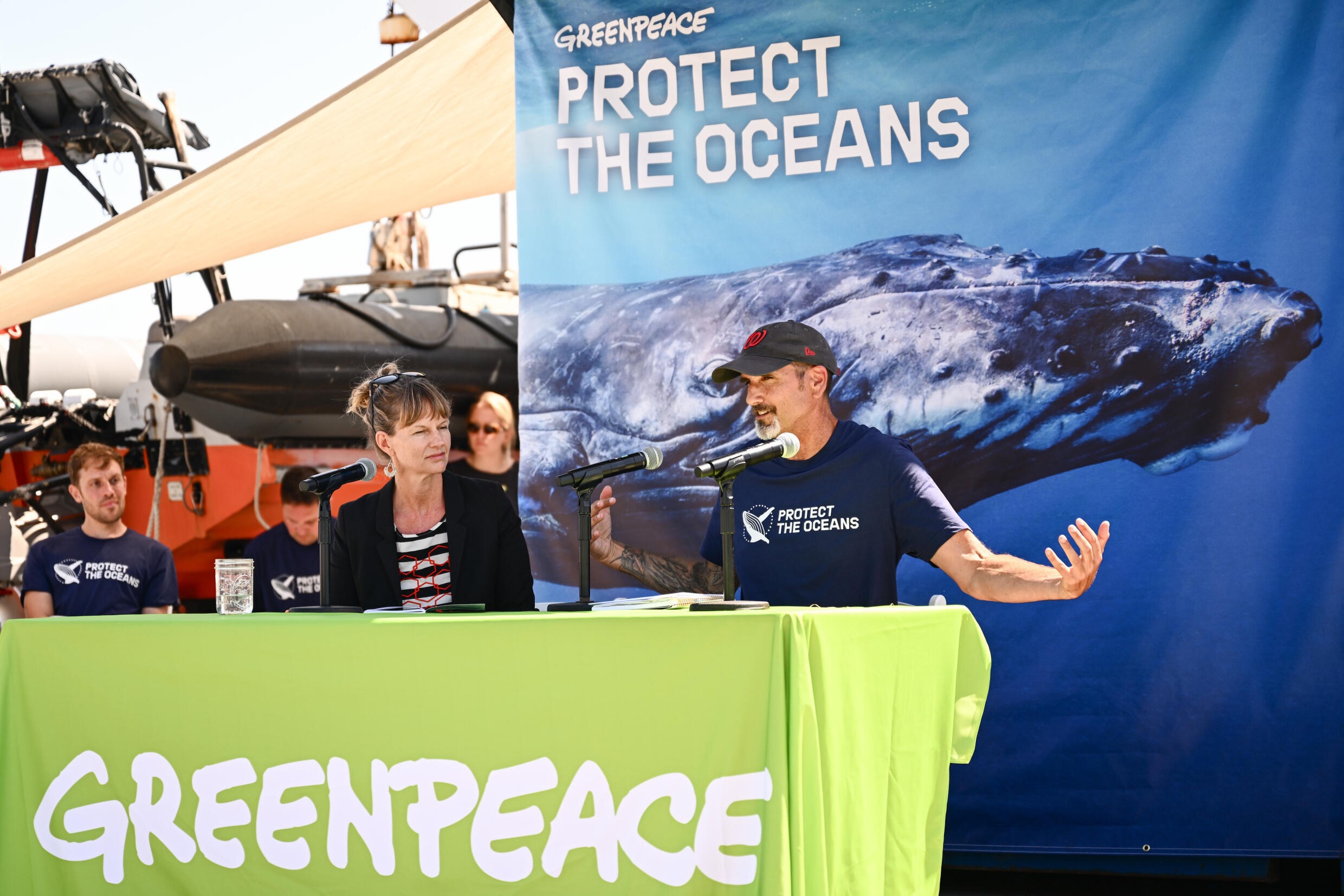 Marine experts and Greenpeace activists speak during a launch event for a Greenpeace report calling for ratification of a global oceans treaty to protect marine biodiversity and fish stocks. Photo: AFP