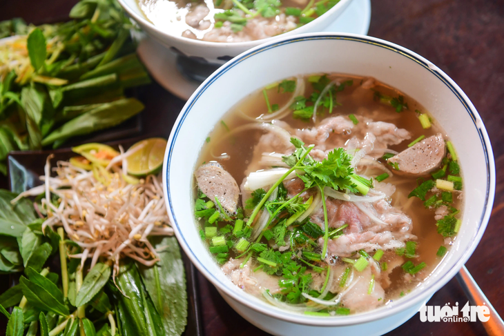 ‘Pho’ in southern Vietnam is often served with bean sprouts and herbs. Photo: Quang Dinh / Tuoi Tre