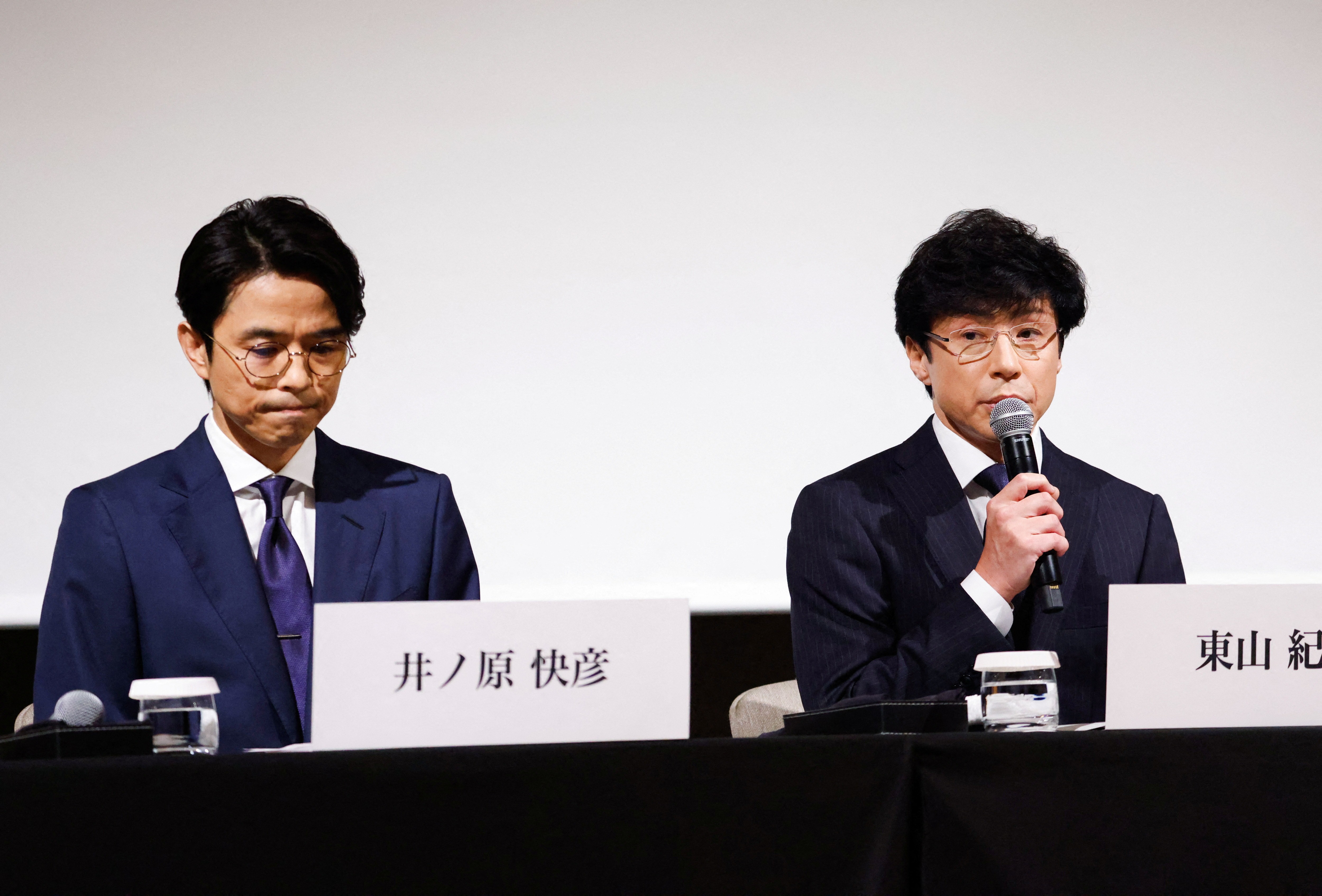 Japan's talent agency Johnny & Associates Chief Noriyuki Higashiyama, flanked by CEO of Johnny's Island Yoshihiko Inohara, attends a news conference in Tokyo, Japan, October 2, 2023. Photo: Reuters