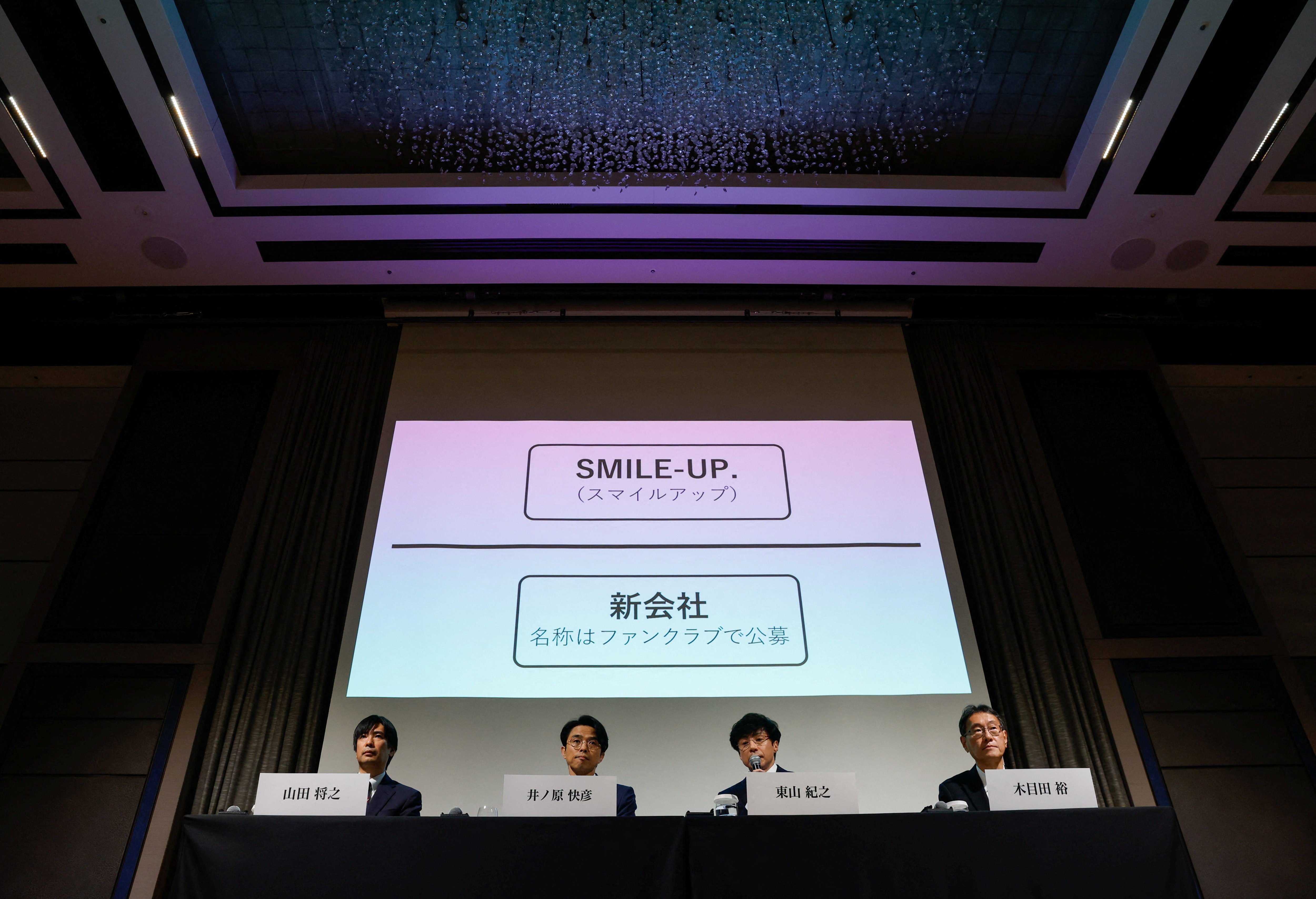 Japan's talent agency Johnny & Associates Chief Noriyuki Higashiyama, flanked by CEO of Johnny's Island Yoshihiko Inohara, chief compliance officer Masayuki Yamada and their lawyer Hiroshi Kimeda unveils the new company name SMILE-UP. during a news conference in Tokyo, Japan, October 2, 2023. Photo: Reuters