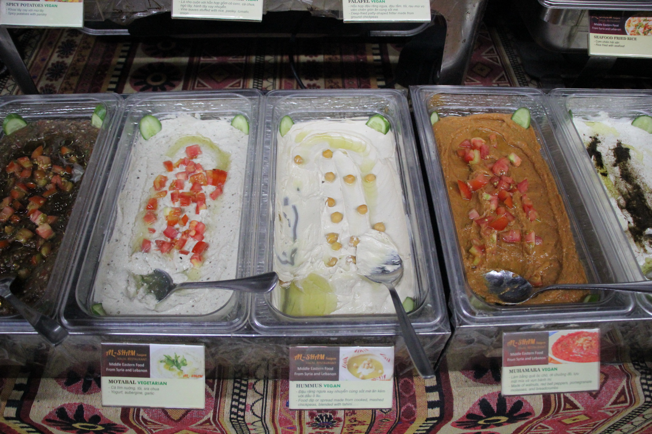 Middle Eastern dips are served at a buffet at Al-Sham Saigon. Photo: Dong Nguyen / Tuoi Tre News