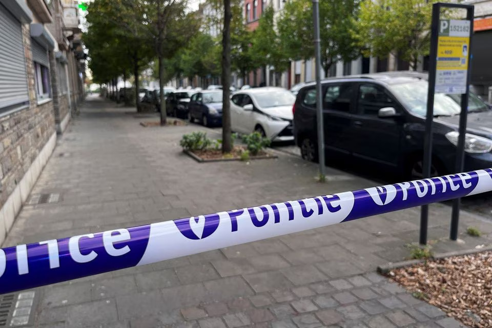 Police barricade tape is seen at a cordoned-off area after a police operation in Schaerbeek near Brussels, Belgium October 17, 2023. Photo: Reuters