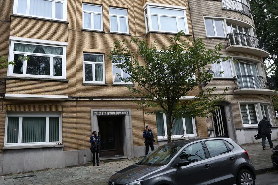 Police officers work after a police operation during which the gunman who killed two Swedish citizens in Brussels was shot, according to local media, in Schaerbeek near Brussels, Belgium, October 17, 2023. Photo: Reuters