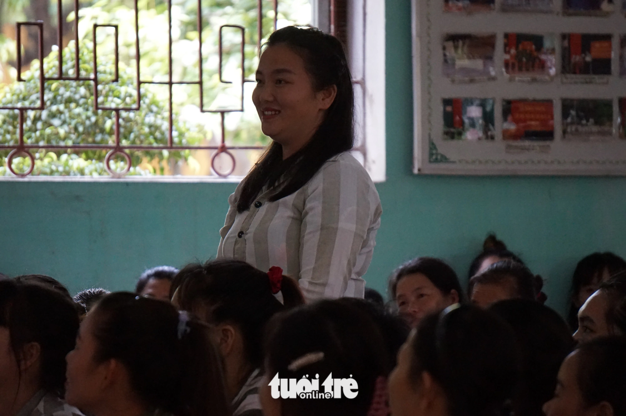 A Hmong woman in prison at Ngoc Ly Prison, Bac Giang Province, northern Vietnam, smiles during a talk show, October 19, 2023. Photo: T. Dieu / Tuoi Tre