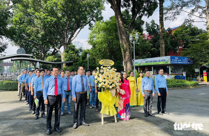 The flower offering ceremony to commemorate Jean Baptiste Louis Pierre, a French botanist who was the first director of the Saigon Zoo and Botanical Garden, is conducted in the zoo in Ho Chi Minh City on October 23, 2023.