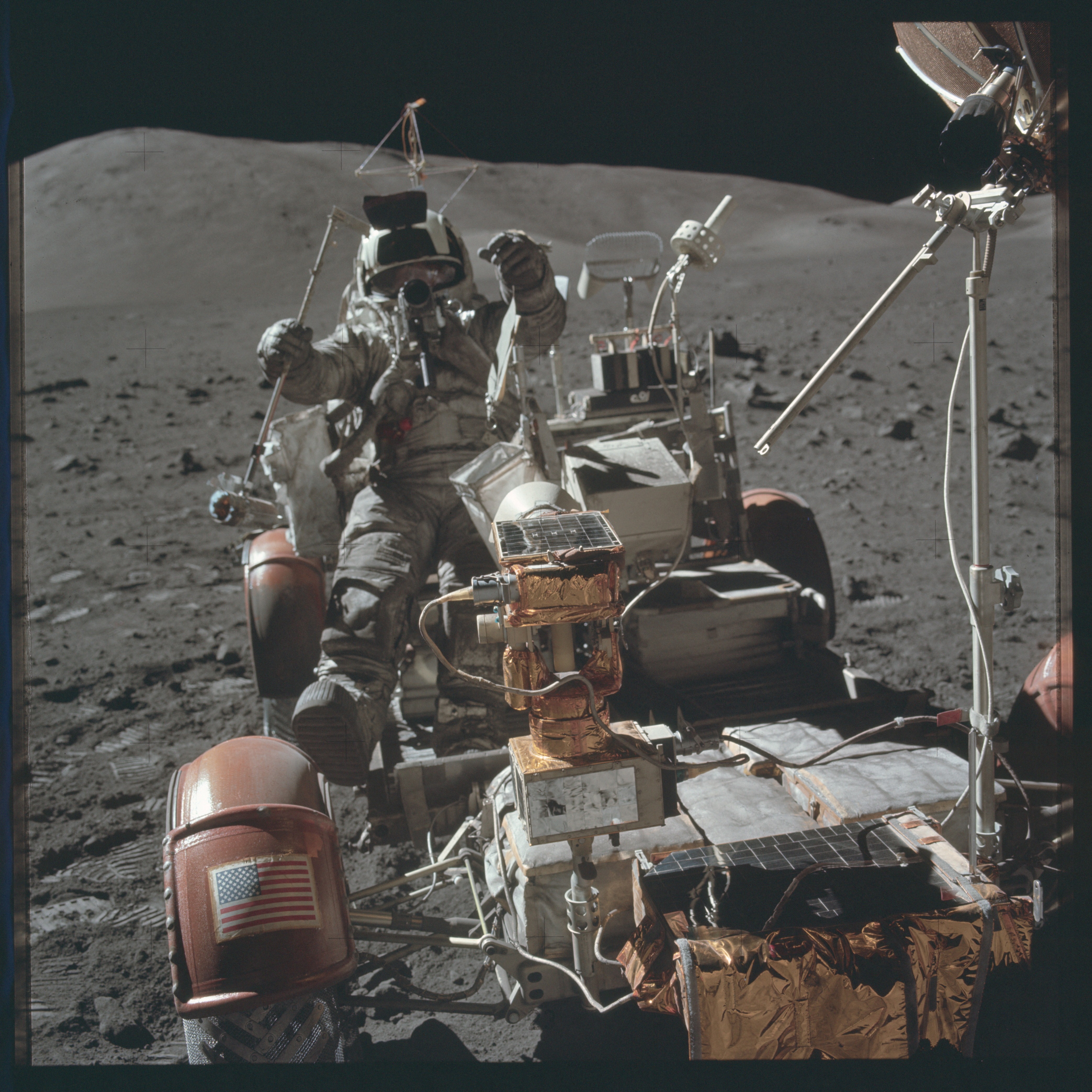 Scientist-astronaut Harrison Schmitt is photographed seated in the Lunar Roving Vehicle (LRV) at Station 9 (Van Serg Crater) during the third Apollo 17 extravehicular activity (EVA) at the Taurus-Littrow landing site during the Apollo 17 mission in this December 13, 1972 NASA handout photo. Photo: Reuters