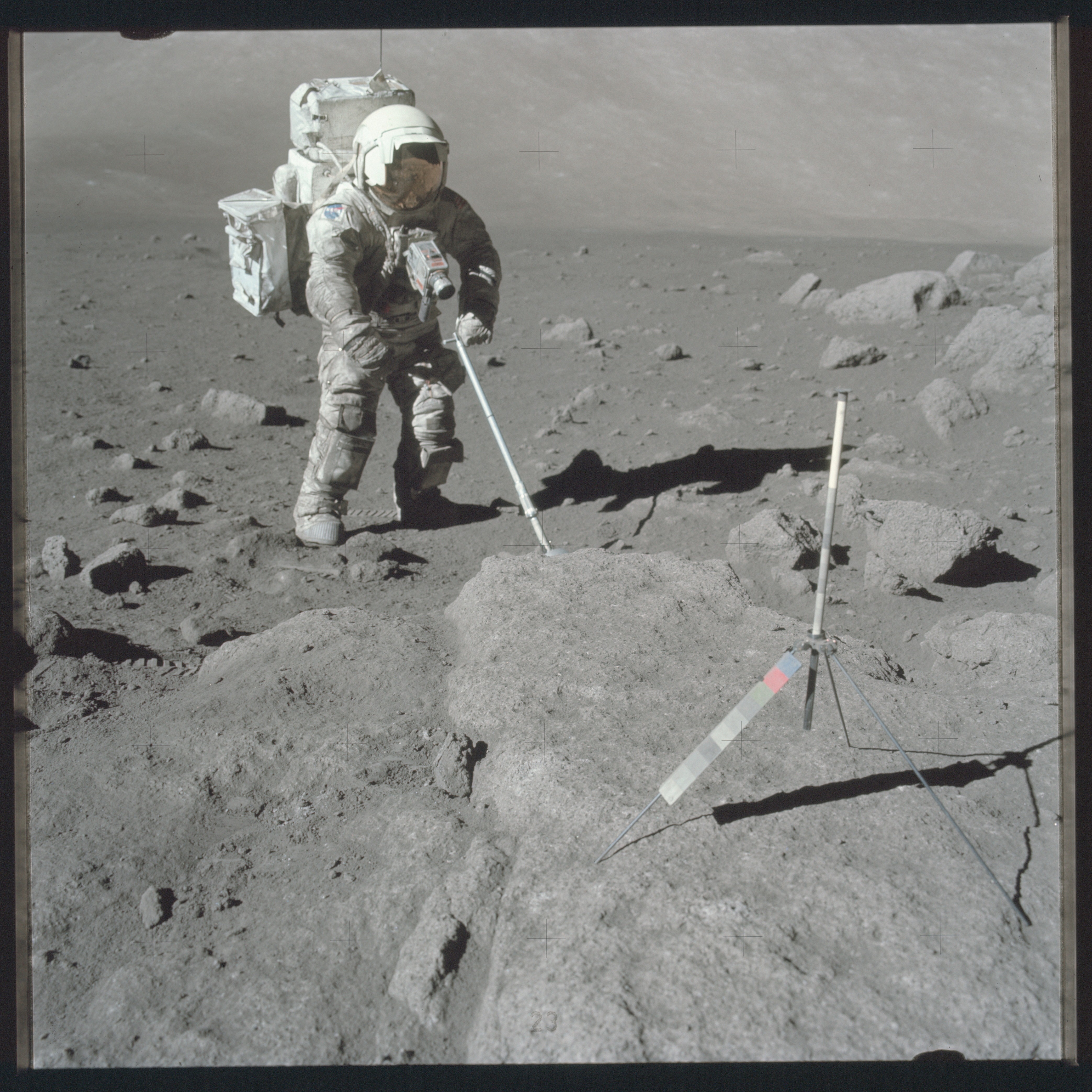 Scientist-astronaut Harrison Schmitt, Apollo 17 lunar module pilot, uses an adjustable sampling scoop to retrieve lunar samples during the second Apollo 17 extravehicular activity in this December 12, 1972 NASA handout photo. Photo: Reuters